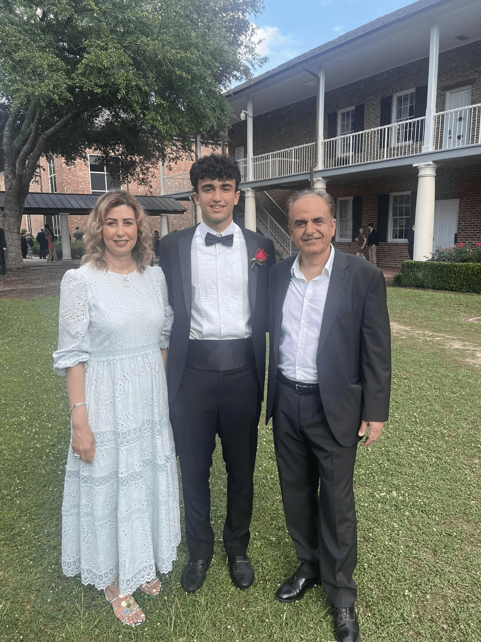 Kareem Badawi with his parents. Photo from Belal Badawi Facebook Page