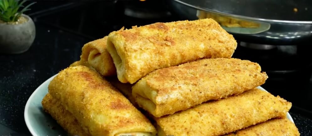 Crispy Cheesy Delights: Potato & Onion Pancakes with a Twist!